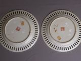 two plates that are sitting on a table