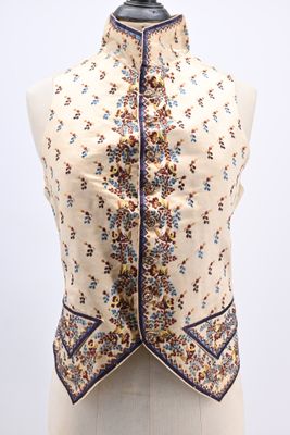 a close up of a mannequin torso with a floral pattern on it