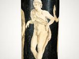 black and white vase with a nude woman on it on a white background