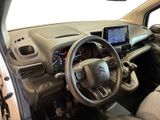 the interior of a car with a steering wheel, dashboard, and dash board