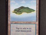 a card that has a picture of a small island on it