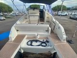 a boat that is sitting in the parking lot