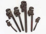 six wrenes are lined up on a white surface with a white background