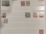 a refrigerator with a lot of stamps on it