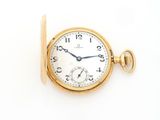 an image of a gold pocket watch with a chain on a white background