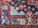 a rug with a design on it sitting on the floor