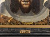 painting of a man with a beard and a collar in a gold frame