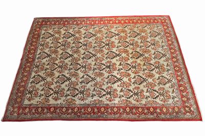 un tapis à bordure rouge sur fond blanc