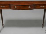 an image of a wooden table with two drawers on top of it