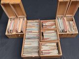 an image of a wooden box filled with lots of records
