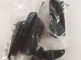 a plastic bag with some black toys inside of it