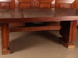 an image of a dining table and chairs in a room