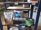 a shelf that has various items on it in a store