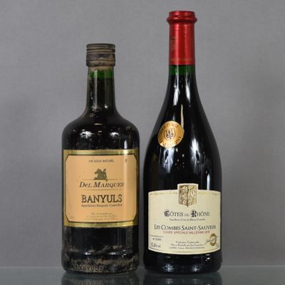 two bottles of wine that are sitting on a table