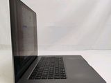 a laptop computer sitting on a table with a white background