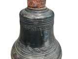 an old metal bell with a rusted top on a white background