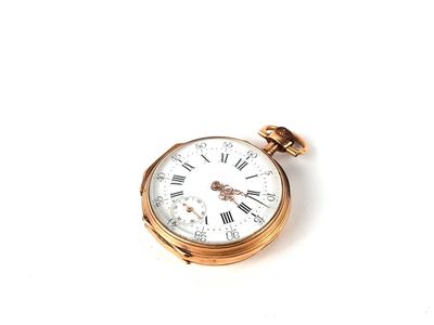 a gold pocket watch with roman numerals on it