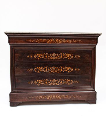 Commode en palissandre et marqueterie de bois clair à motifs… - Photo 1