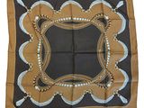 a brown and black square scarf with a design on it
