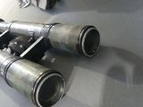 a pair of binoculars sitting on a table next to a bag