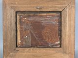 an old wooden picture frame with a screw in the middle