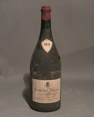 a bottle of wine that is sitting on a table