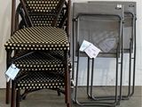a stack of chairs and a table in a room