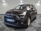 l'avant d'une Citroën noire garée sur un sol à damier
