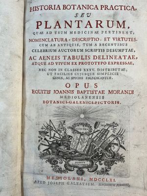 an old book with a picture of a man holding a sword
