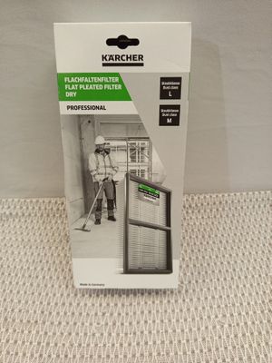 le colis se trouve dans le carton de l'aspirateur