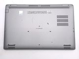 a laptop that is sitting on a white surface