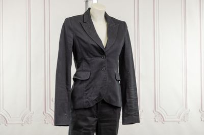 an image of a woman ' s suit on a mannequin dummy