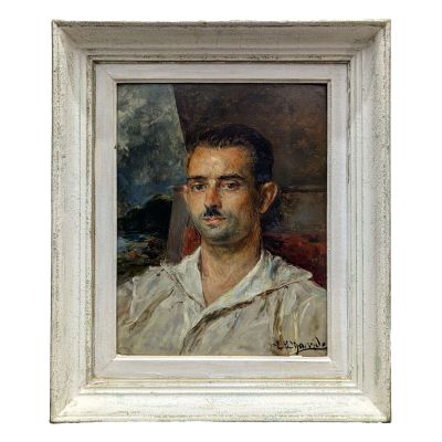 un tableau représentant un homme moustachu, dans un cadre blanc