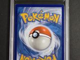 a close up of a pokemon card on a table