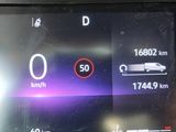 a picture of a car dashboard showing the speed of the car