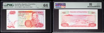 three different types of currency are on display in a display case