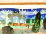 une image d'un tableau sur le mur d'un bâtiment