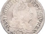 a close up of a coin on a white background