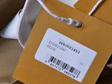 a label on a brown bag with a barcode on it