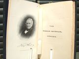 an open book with a picture of a man on it