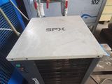 a close up of a machine that is sitting on a pallet