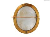 an image of a gold and white circular light fixture