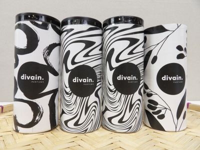 three different types of divining cans sitting on top of a table