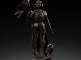 a bronze statue of a woman holding a flag on a pedestal