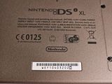 a close up of the back of a nintendo 3ds xl