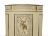 an image of a white cabinet with a flower design on the front
