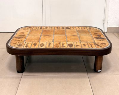 an image of a coffee table with a tile top