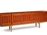 an image of a wooden sideboard with four doors and three drawers