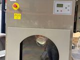 a washing machine that is sitting in a warehouse