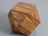 a wooden object that is on a table